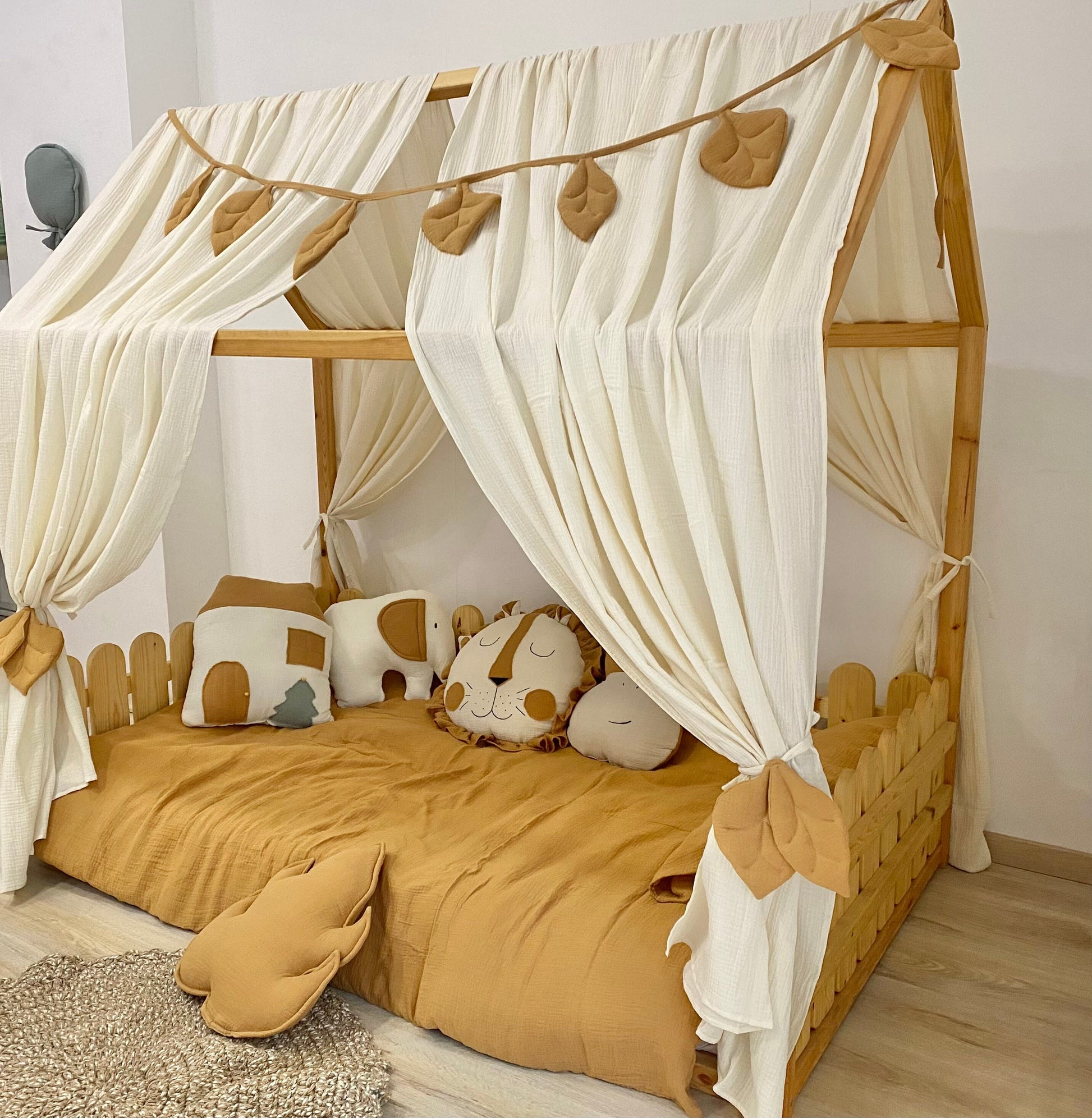 Woodland themed kids reading nook with canopy