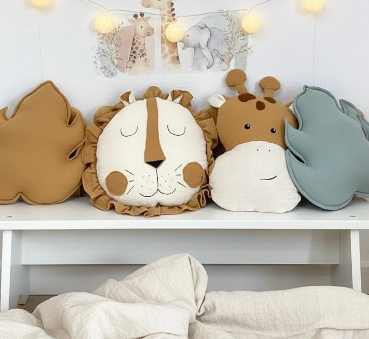 Safari nursery pillow set on shelf