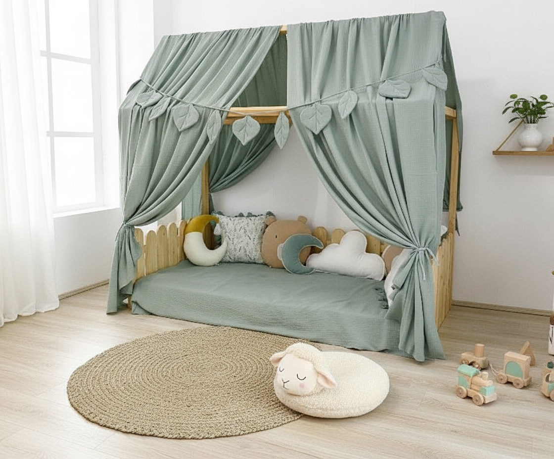 Montessori play space with leaf garland