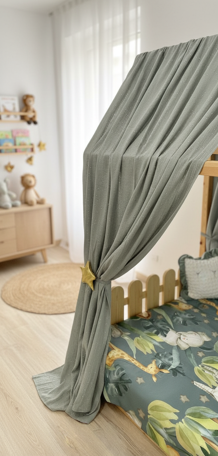 Sage grey canopy over Montessori floor bed with star tiebacks