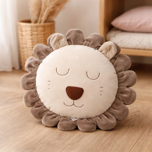 Handmade lion pillow in neutral tones for safari nursery decor in kids room